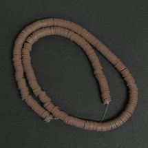 Fimohelmi kiekko n. 40-45 cm maitosuklaa nauhassa