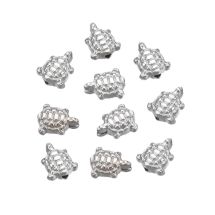 Synteettinen helmi pieni kilpikonna hopeanvärinen n. 9.5x8x4mm 10 kpl