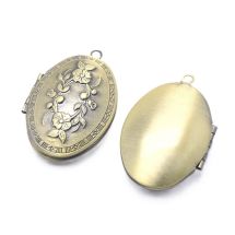Metalliriipus ja lukko avattava medaljonki litteä, kukkaköynnöskuvioitu ovaali antiikkimessinginvärinen 42x27mm
