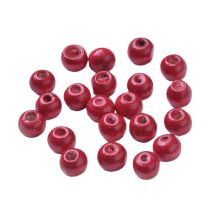 Puuhelmi pyöreähkö n. 8x7 mm maalattu punainen n. 10g