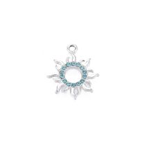 Metallimaskotti aurinko platinanvärinen / turkoosit strassit 19x16,5 mm