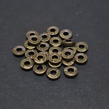 Metallihelmi litteä rondelli 5-6x2 mm antiikkimessinginvärinen 20 kpl