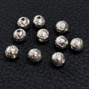 Metallihelmi hopeoitu pyöreä ruusukuviolla 7x6 mm 10 kpl