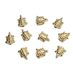 Synteettinen helmi pieni kilpikonna vaalea kullanvärinen n. 9.5x8x4mm 10 kpl