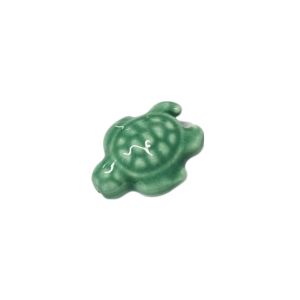 Keraaminen helmi kilpikonna n. 19x15 mm vaalea merenvihreä