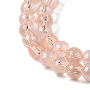 Pyöreähkö lasihelmi läpikuultava hohdepintaväri n. 6 mm vaalea persikka 25 kpl
