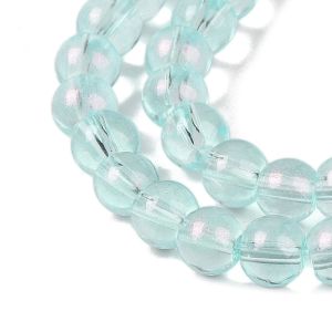 Pyöreähkö lasihelmi läpikuultava hohdepintaväri n. 6 mm vaalea aqua 25 kpl