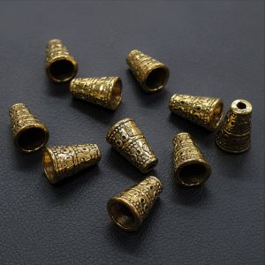 Kalotti antiikkikullanvärinen kuvioitu 7x10 mm 10 kpl