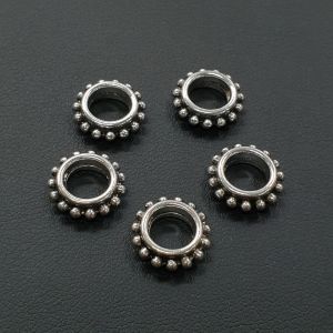 Metallihelmi isoreikäinen kuvioitu rondelli antiikkihopeanvärinen 4,5x13,5 mm 5 kpl