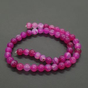 Tukkuerä kivihelmi pyöreä 8 mm akaatti fuksia n. 37 cm nauha (V)
