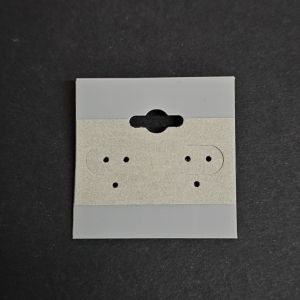 Korvakorukortti harmaa muovi/sametti 3,8 cm tukkuerä n. 100 kpl