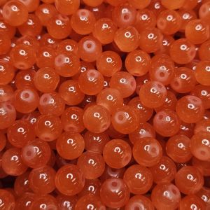 Pyöreä lasihelmi läpikuultava pintaväri n. 8 mm tumma persikka 25 kpl